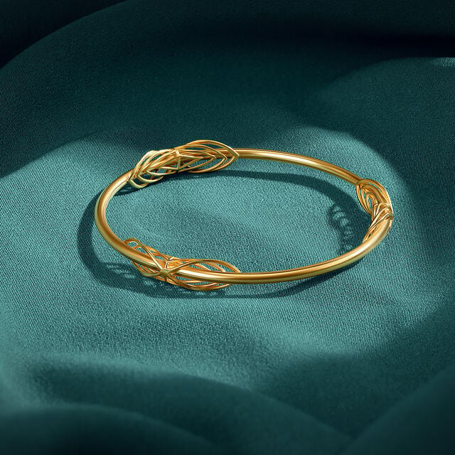 Intertwined Radiance Gold Bangle